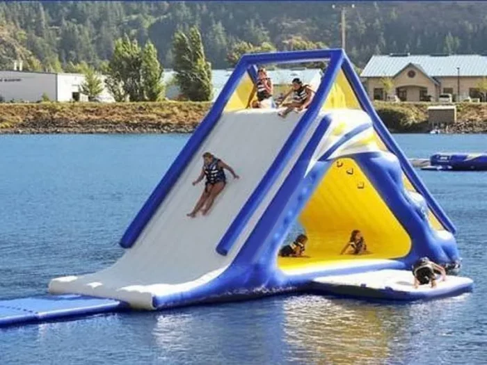 Inflatable water slide and climbing structure, perfect for lakes and water parks. Durable and fun. Buy water inflatables online in Australia today!