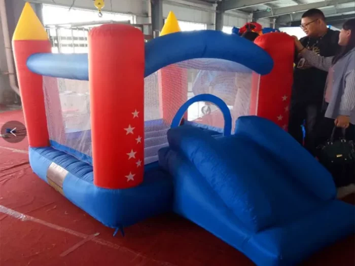 Mini rocket-themed jumping castle with slide, perfect for kids' parties. Compact and fun. Buy affordable inflatables online in Australia today!