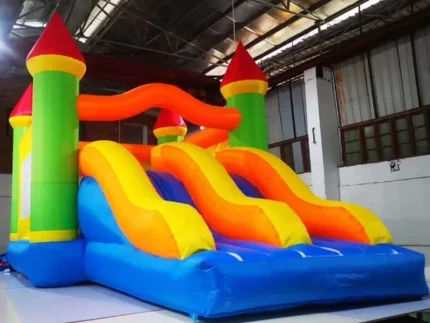 Vibrant inflatable castle with dual slides, perfect for kids' parties and events. Durable and fun. Buy online in Australia today!